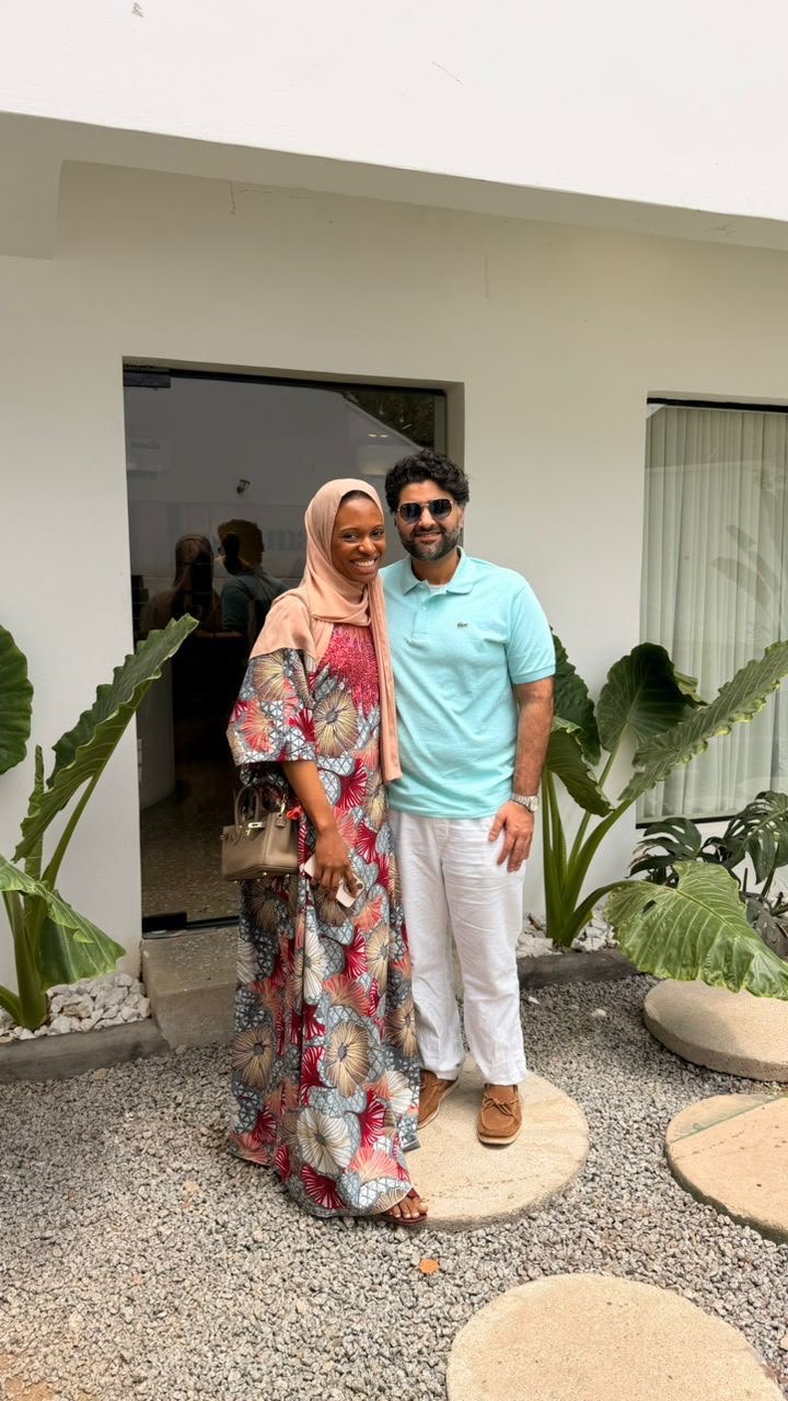 Amal and Usman dressed up together while traveling